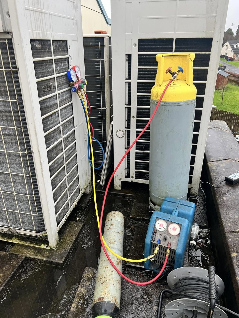 Leak testing a twin split air conditioning system
