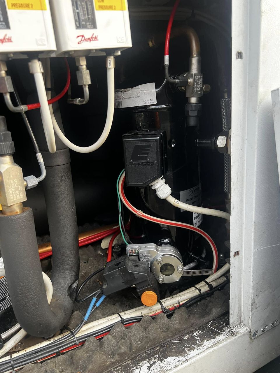 Inside a Danfoss condensing unit during maintenance