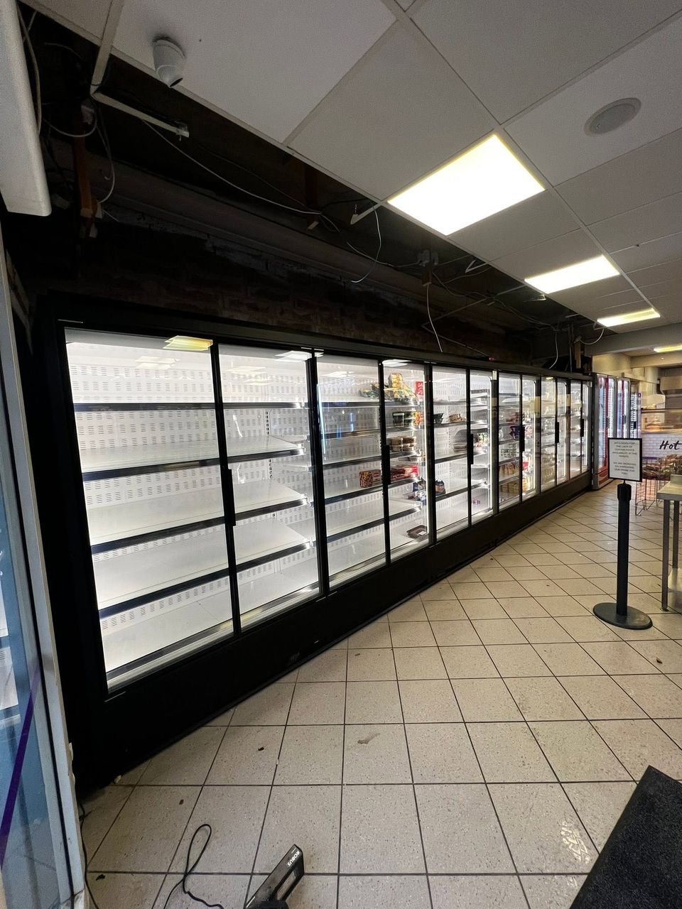 Row of glass-door chilled cabinets