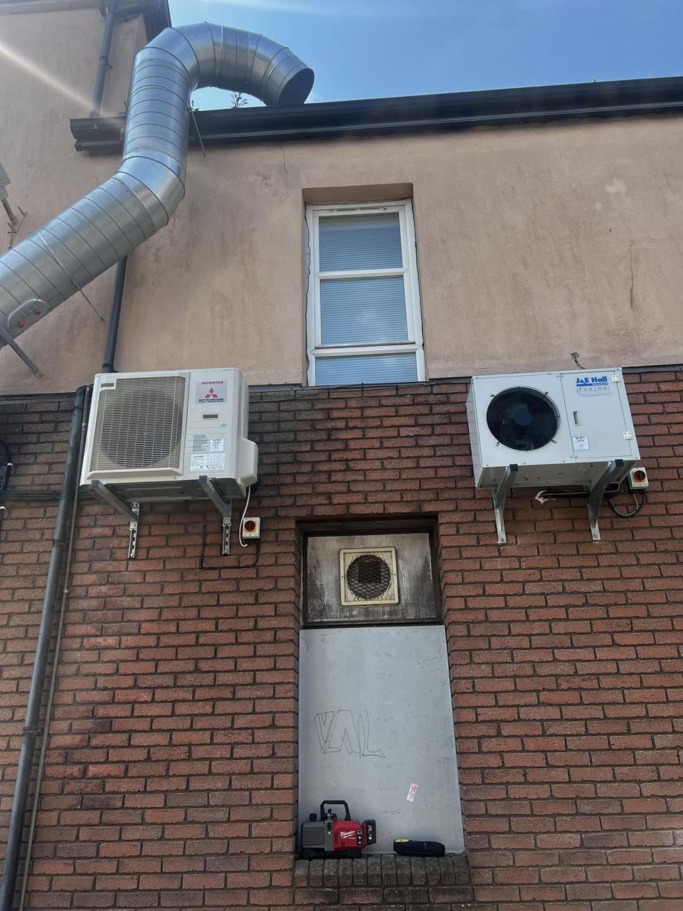 Air conditioning outdoor units on the building wall